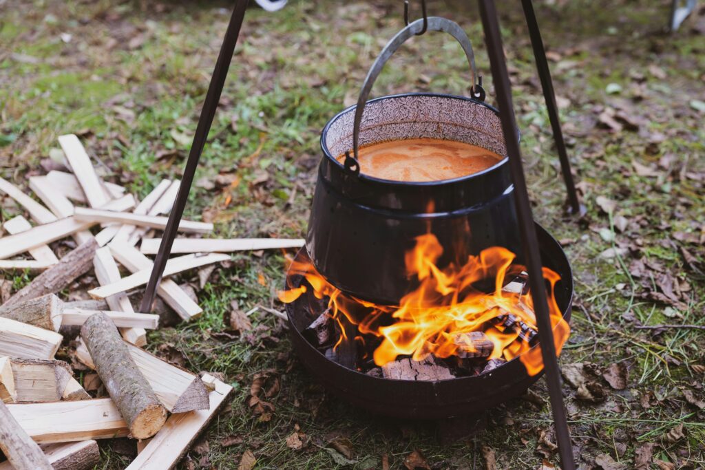 soup in a cauldron over fire